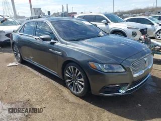 2017 Lincoln Continental Reserve z VIN 1LN6L9RP0H5636532, wystawiony jako IAAI lot #41882280 z przebiegiem 98 733 mil mil oraz . Historia ofert i sprzedaży dostępna na DreamBid. Obrazek 1.