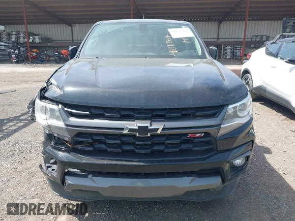 2021 Chevrolet Colorado 4WD Z71 z VIN 1GCGTDEN1M1256939, wystawiony jako IAAI lot #42071364 z przebiegiem 38 972 mil mil oraz . Historia ofert i sprzedaży dostępna na DreamBid. Obrazek 12.