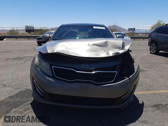 2012 Kia Optima SX z VIN 5XXGR4A60CG044520, wystawiony jako Copart lot #56013155 z przebiegiem 155 487 mil mil oraz Szkoda całkowita • Salvage title. Historia ofert i sprzedaży dostępna na DreamBid. Obrazek 5.