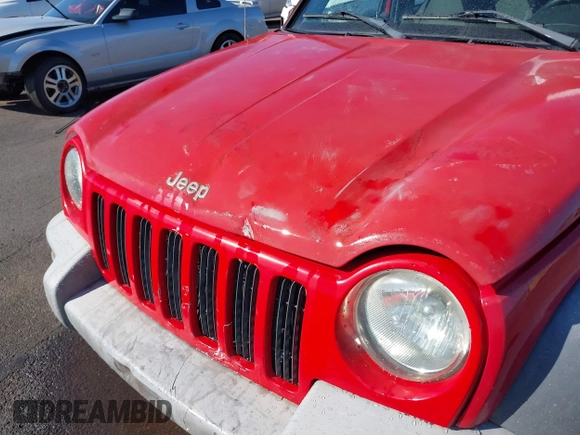 2004 Jeep Liberty Sport with VIN 1J4GL48K04W326252, listed as a IAAI auction lot 41479037 with 168,994 mi miles. Bid and sale history available at carsss.com. Image 6.