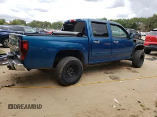 2011 GMC Canyon SLE1 with VIN 1GTH6MFE3B8119385, listed as a Copart auction lot 70492994 with 105,305 mi miles and Salvage Title. Bid and sale history available at carsss.com. Image 3.