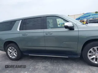 2023 Chevrolet Suburban Premier with VIN 1GNSCFKD2PR377493, listed as a IAAI auction lot 42426988 with 71,365 mi miles and . Bid and sale history available at DreamBid. Image 14.