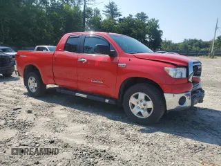2010 Toyota Tundra 4WD Truck with VIN 5TFUY5F1XAX102227, listed as a Copart auction lot 65028044 with 48,754 mi miles and Salvage Title. Bid and sale history available at carsss.com. Image 4.
