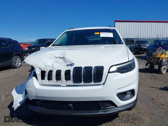 2021 Jeep Cherokee Altitude with VIN 1C4PJLLBXMD164087, listed as a IAAI auction lot 41694113 with 76,352 mi miles. Bid and sale history available at carsss.com. Image 12.