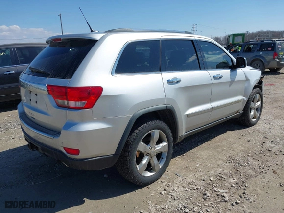 2011 Jeep Grand Cherokee Limited with VIN 1J4RR5GT9BC510322, listed as a IAAI auction lot 42003802 with 211,684 mi miles. Bid and sale history available at carsss.com. Image 4.