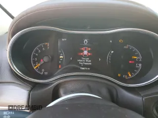 2014 Jeep Grand Cherokee Overland with VIN 1C4RJECGXEC529438, listed as a Copart auction lot 45693285 with 154,674 mi miles and Salvage Title. Bid and sale history available at carsss.com. Image 9.