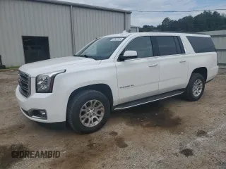 2017 GMC Yukon XL SLT with VIN 1GKS1GKC5HR337622, listed as a Copart auction lot 67837964 with 150,424 mi miles and Salvage Title. Bid and sale history available at carsss.com. Image 1.