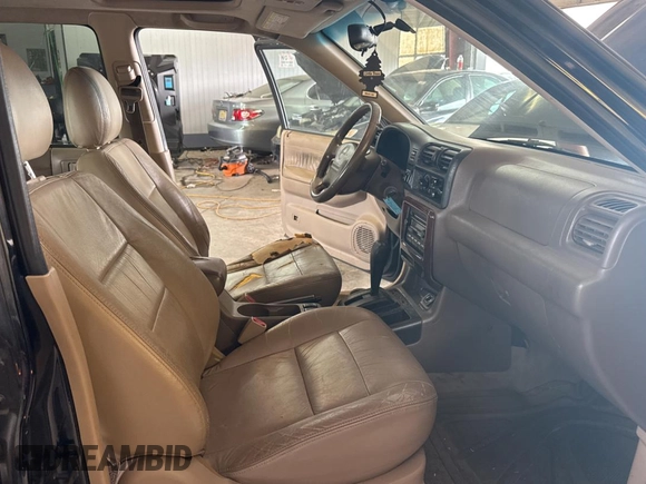 2002 Isuzu Rodeo S with VIN 4S2CK58W124336947, listed as a Copart auction lot 63482935 with 248,008 mi miles and Clean title. Bid and sale history available at DreamBid. Image 5.