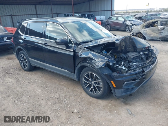 2021 Volkswagen Tiguan SE with VIN 3VV3B7AX3MM157702, listed as a IAAI auction lot 41888479 with 51,807 mi miles and . Bid and sale history available at DreamBid. Image 1.