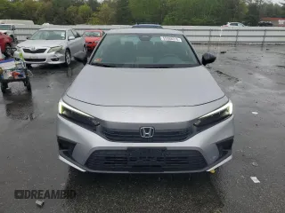 2022 Honda Civic Sport z VIN 2HGFE2F57NH597601, wystawiony jako Copart lot #55588515 z przebiegiem 12 576 mil mil oraz Szkoda całkowita • Salvage title. Historia ofert i sprzedaży dostępna na DreamBid. Obrazek 5.