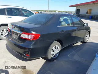 2012 Toyota Corolla L with VIN 5YFBU4EE8CP061390, listed as a IAAI auction lot 41872545 with 104,476 mi miles. Bid and sale history available at carsss.com. Image 4.
