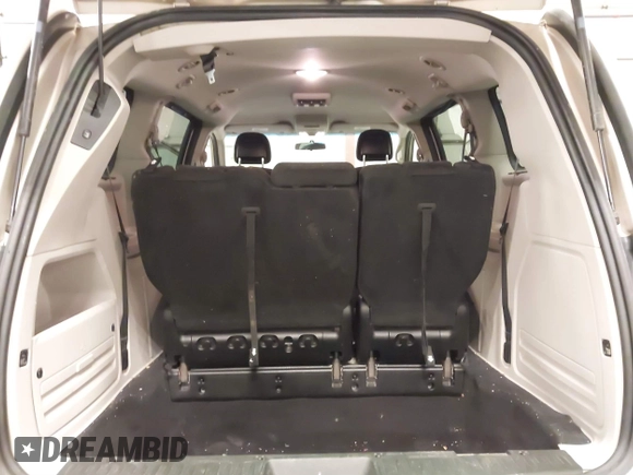 2013 Dodge Grand Caravan SXT with VIN 2C4RDGCG0DR567186, listed as a IAAI auction lot 41706119 with 112,512 mi miles and . Bid and sale history available at DreamBid. Image 18.