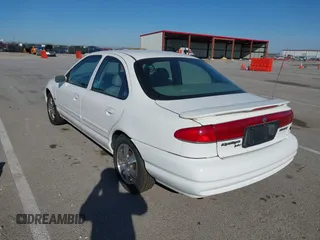 1998 Mercury Mystique z VIN 1MEFM66L2WK653881, wystawiony jako IAAI lot #41807702 z przebiegiem 119 158 mil mil oraz . Historia ofert i sprzedaży dostępna na DreamBid. Obrazek 3.