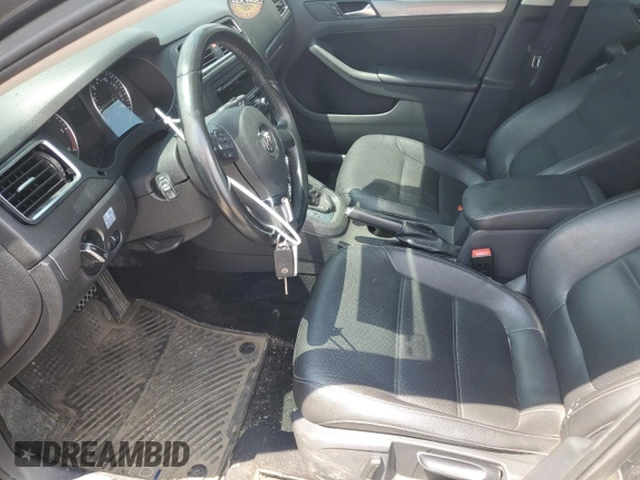 2013 Volkswagen Jetta TDI w/Premium with VIN 3VWLL7AJ6DM440499, listed as a Copart auction lot 60189355 with 148,786 mi miles and Clean title. Bid and sale history available at DreamBid. Image 7.