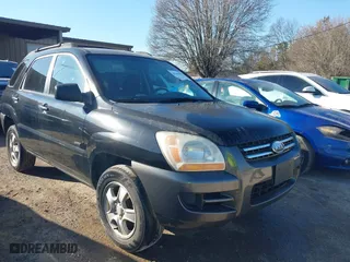 2007 Kia Sportage LX with VIN KNDJE724477444949, listed as a IAAI auction lot 41641902 with 231,916 mi miles. Bid and sale history available at carsss.com. Image 1.