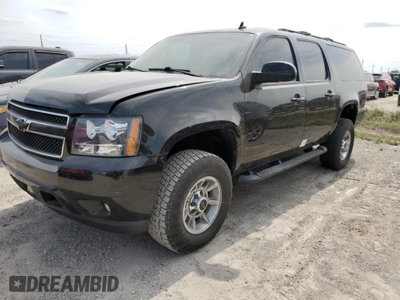 2013 Chevrolet Suburban with VIN 1GNWKMEG4DR257785, listed as a Copart auction lot 76817344 with 68,021 mi miles and Salvage title. Bid and sale history available at DreamBid. Image 1.