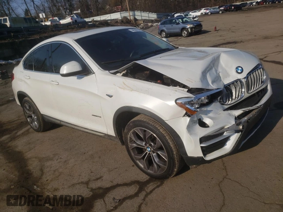 2015 BMW X4 xDrive28i with VIN 5UXXW3C59F0F89503, listed as a Copart auction lot 44500354 with 141,431 mi miles. Bid and sale history available at carsss.com. Image 4.
