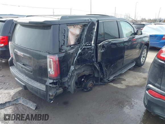 2016 GMC Yukon SLE with VIN 1GKS2AKC3GR398556, listed as a IAAI auction lot 41585972 with 130,961 mi miles. Bid and sale history available at carsss.com. Image 4.