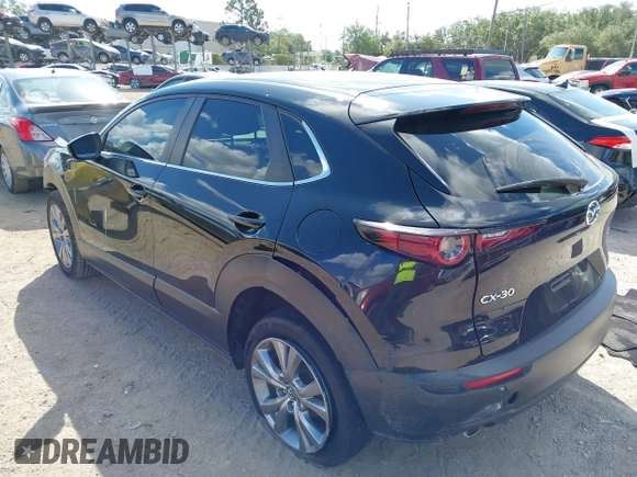2021 Mazda CX-30 Select z VIN 3MVDMABL1MM251761, wystawiony jako IAAI lot #42267217 z przebiegiem 42 617 mil mil oraz . Historia ofert i sprzedaży dostępna na DreamBid. Obrazek 3.