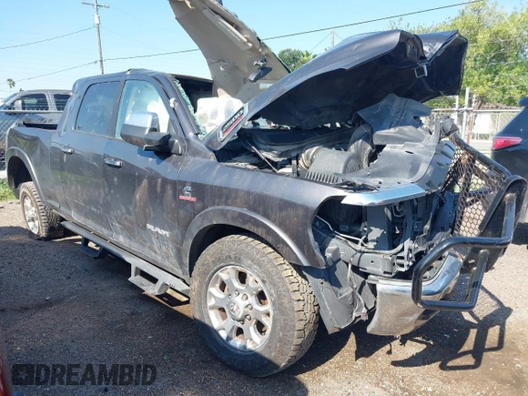 2020 Ram 2500 Laramie z VIN 3C6UR5NLXLG314141, wystawiony jako IAAI lot #42263978 z przebiegiem Nie podano mil oraz . Historia ofert i sprzedaży dostępna na DreamBid. Obrazek 1.