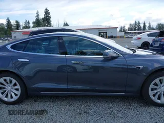 2017 Tesla Model S 100D with VIN 5YJSA1E27HF202563, listed as a IAAI auction lot 42460702 with 71,715 mi miles and . Bid and sale history available at DreamBid. Image 13.
