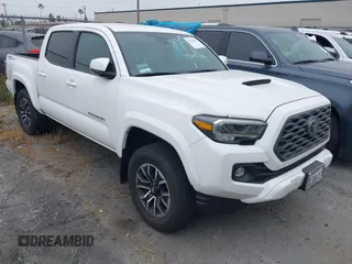 2023 Toyota Tacoma SR5 z VIN 3TMAZ5CNXPM208862, wystawiony jako IAAI lot #42206860 z przebiegiem 11 354 mil mil oraz . Historia ofert i sprzedaży dostępna na DreamBid. Obrazek 1.