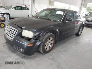 2007 Chrysler 300 Touring with VIN 2C3KA53G17H869258, listed as a IAAI auction lot 42399212 with 237,633 mi miles and . Bid and sale history available at DreamBid. Image 2.