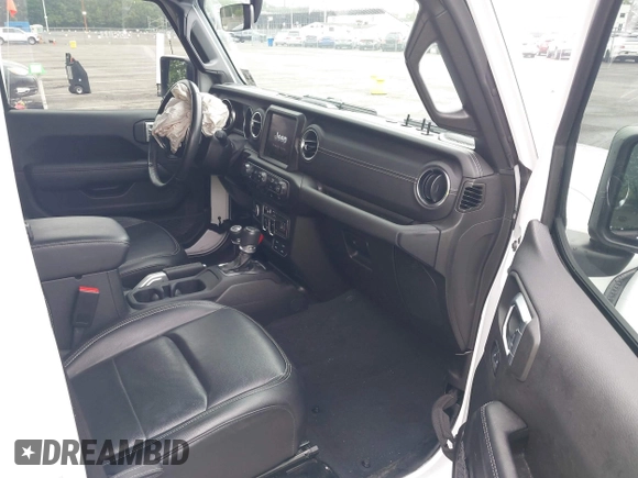 2022 Jeep Wrangler Unlimited Sahara with VIN 1C4JJXP69NW229124, listed as a IAAI auction lot 42525560 with 45,857 mi miles and . Bid and sale history available at DreamBid. Image 5.