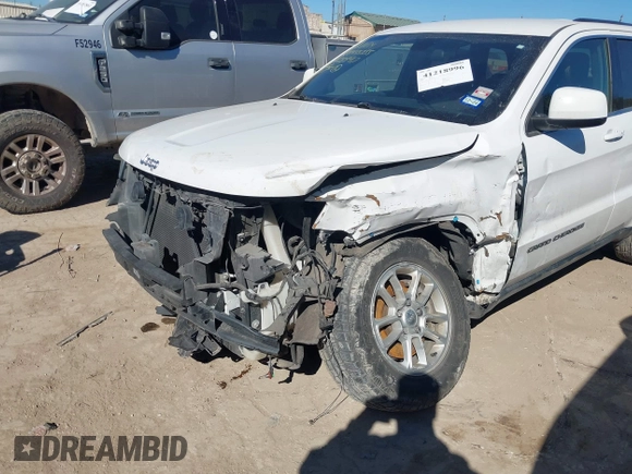 2018 Jeep Grand Cherokee Laredo E with VIN 1C4RJEAG2JC428990, listed as a IAAI auction lot 41218996 with 123,758 mi miles. Bid and sale history available at carsss.com. Image 6.