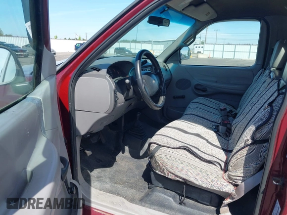 1998 Ford F-150 with VIN 1FTZF182XWKA36602, listed as a IAAI auction lot 42472442 with 112,235 mi miles and . Bid and sale history available at DreamBid. Image 5.