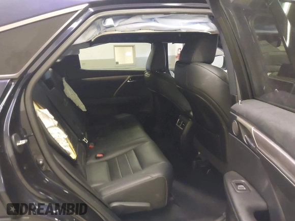 2021 Lexus RX 350 F Sport with VIN 2T2SZMDA6MC293404, listed as a IAAI auction lot 41825619 with 61,599 mi miles and . Bid and sale history available at DreamBid. Image 8.