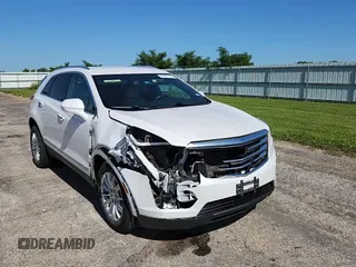 2017 Cadillac XT5 FWD z VIN 1GYKNARS2HZ173122, wystawiony jako Copart lot #63027715 z przebiegiem 130 467 mil mil oraz Czysty tytuł • Clean title. Historia ofert i sprzedaży dostępna na DreamBid. Obrazek 14.