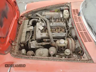 1978 Alfa Romeo Spider z VIN 115410002071, wystawiony jako Copart lot #75574404 z przebiegiem 50 587 mil mil oraz Tytuł czysty. Historia ofert i sprzedaży dostępna na DreamBid. Obrazek 11.