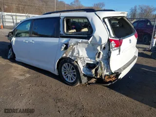 2013 Toyota Sienna XLE AAS with VIN 5TDYK3DC8DS402418, listed as a IAAI auction lot 41752030 with 193,390 mi miles. Bid and sale history available at carsss.com. Image 3.