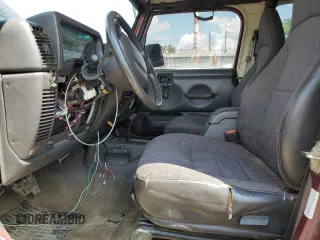 2002 Jeep Wrangler X with VIN 1J4FA39SX2P732881, listed as a Copart auction lot 64451185 with Not provided miles and Clean title. Bid and sale history available at DreamBid. Image 7.