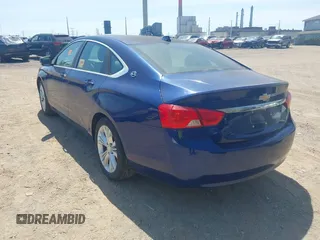 2014 Chevrolet Impala LT with VIN 1G1115SL3EU109535, listed as a IAAI auction lot 42099118 with 120,295 mi miles and . Bid and sale history available at DreamBid. Image 3.