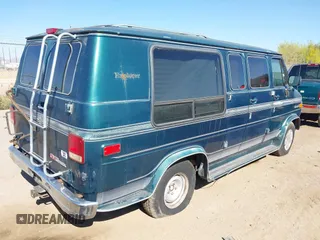 1994 GMC Vandura z VIN 1GDEG25K4RF523356, wystawiony jako IAAI lot #41854612 z przebiegiem 187 013 mil mil oraz . Historia ofert i sprzedaży dostępna na DreamBid. Obrazek 4.