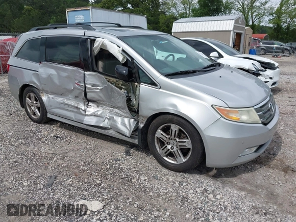 2012 Honda Odyssey Touring с VIN 5FNRL5H90CB083157, выставлен на аукционе IAAI как лот 42176609 с пробегом 250 000 миль миль и . История ставок и продаж доступна на DreamBid. Изображение 1.