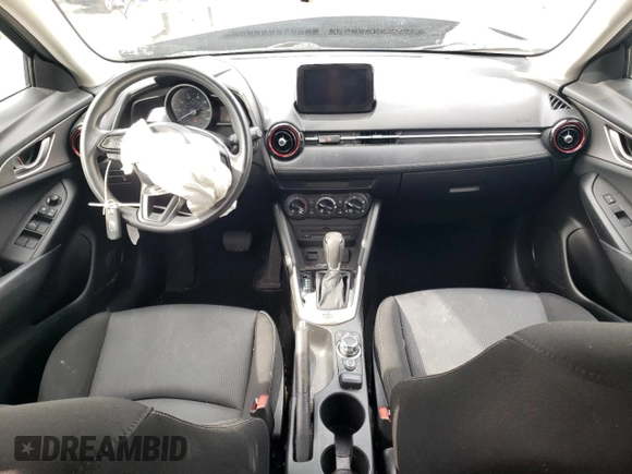 2018 Mazda CX-3 Sport with VIN JM1DKFB78J0315770, listed as a Copart auction lot 50004525 with 94,301 mi miles and Salvage Title. Bid and sale history available at DreamBid. Image 8.