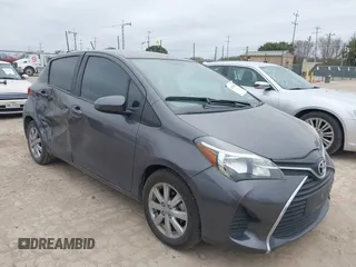 2015 Toyota Yaris L z VIN VNKKTUD39FA030409, wystawiony jako IAAI lot #41363044 z przebiegiem 82 611 mil mil oraz . Historia ofert i sprzedaży dostępna na DreamBid. Obrazek 1.
