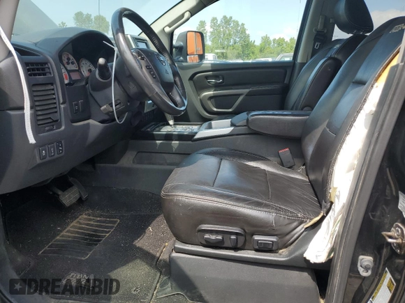 2015 Nissan Titan Pro-4X with VIN 1N6BA0EC1FN507894, listed as a Copart auction lot 65784274 with 147,576 mi miles and Salvage title. Bid and sale history available at DreamBid. Image 7.