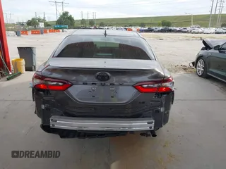 2023 Toyota Camry LE z VIN 4T1C11AK3PU719452, wystawiony jako IAAI lot #38236100 z przebiegiem 34 140 mil mil oraz . Historia ofert i sprzedaży dostępna na DreamBid. Obrazek 17.