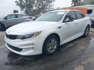 2018 Kia Optima LX with VIN 5XXGT4L3XJG215632, listed as a IAAI auction lot 41785035 with 94,854 mi miles and . Bid and sale history available at DreamBid. Image 2.