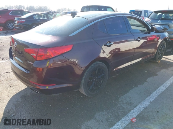2012 Kia Optima EX with VIN 5XXGN4A74CG041804, listed as a IAAI auction lot 41152387 with 167,738 mi miles. Bid and sale history available at carsss.com. Image 4.