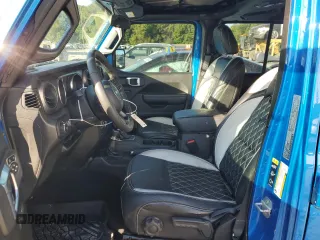 2022 Jeep Wrangler Unlimited Sport S z VIN 1C4HJXDG4NW224683, wystawiony jako Copart lot #70258994 z przebiegiem 21 098 mil mil oraz Szkoda całkowita • Salvage title. Historia ofert i sprzedaży dostępna na DreamBid. Obrazek 7.
