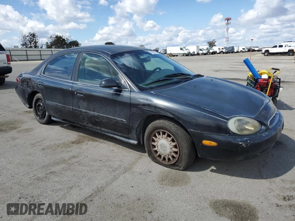 1997 Mercury Sable GS z VIN 1MELM50U1VA620597, wystawiony jako Copart lot #51635765 z przebiegiem 250 824 mil mil oraz Szkoda całkowita • Salvage title. Historia ofert i sprzedaży dostępna na DreamBid. Obrazek 4.