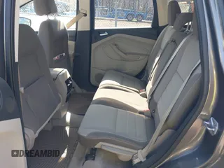 2013 Ford Escape SE with VIN 1FMCU9G94DUC98363, listed as a IAAI auction lot 41752773 with 150,547 mi miles and . Bid and sale history available at DreamBid. Image 8.