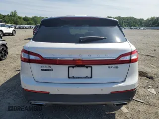 2016 Lincoln MKX Reserve with VIN 2LMTJ8LPXGBL38015, listed as a Copart auction lot 60981375 with 101,589 mi miles and Salvage title. Bid and sale history available at DreamBid. Image 6.