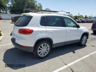 2012 Volkswagen Tiguan SE z VIN WVGAV7AX5CW546378, wystawiony jako Copart lot #58186695 z przebiegiem 67 483 mil mil oraz Szkoda całkowita • Salvage title. Historia ofert i sprzedaży dostępna na DreamBid. Obrazek 3.