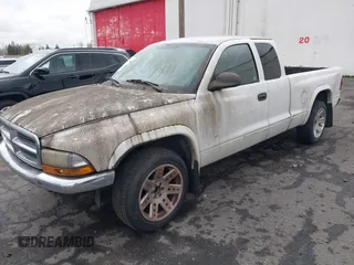2003 Dodge Dakota SLT with VIN 1D7HL42N83S296040, listed as a IAAI auction lot 41462371 with 250,407 mi miles. Bid and sale history available at carsss.com. Image 2.